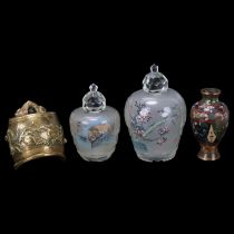 A graduated pair of Peking glass jars, with internally painted birds and blossom, and faceted