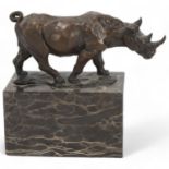 Contemporary bronze rhino sculpture, on marble block base, indistinctly signed, rhino length 15.5cm,