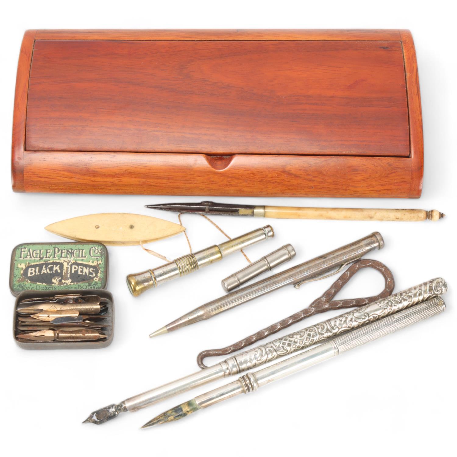 A group of 19th century writing instruments, in hardwood penbox