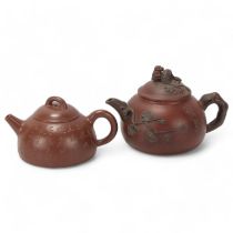 A Chinese Yixing style teapot with monkey knop, character marks to base and sides, height 12cm