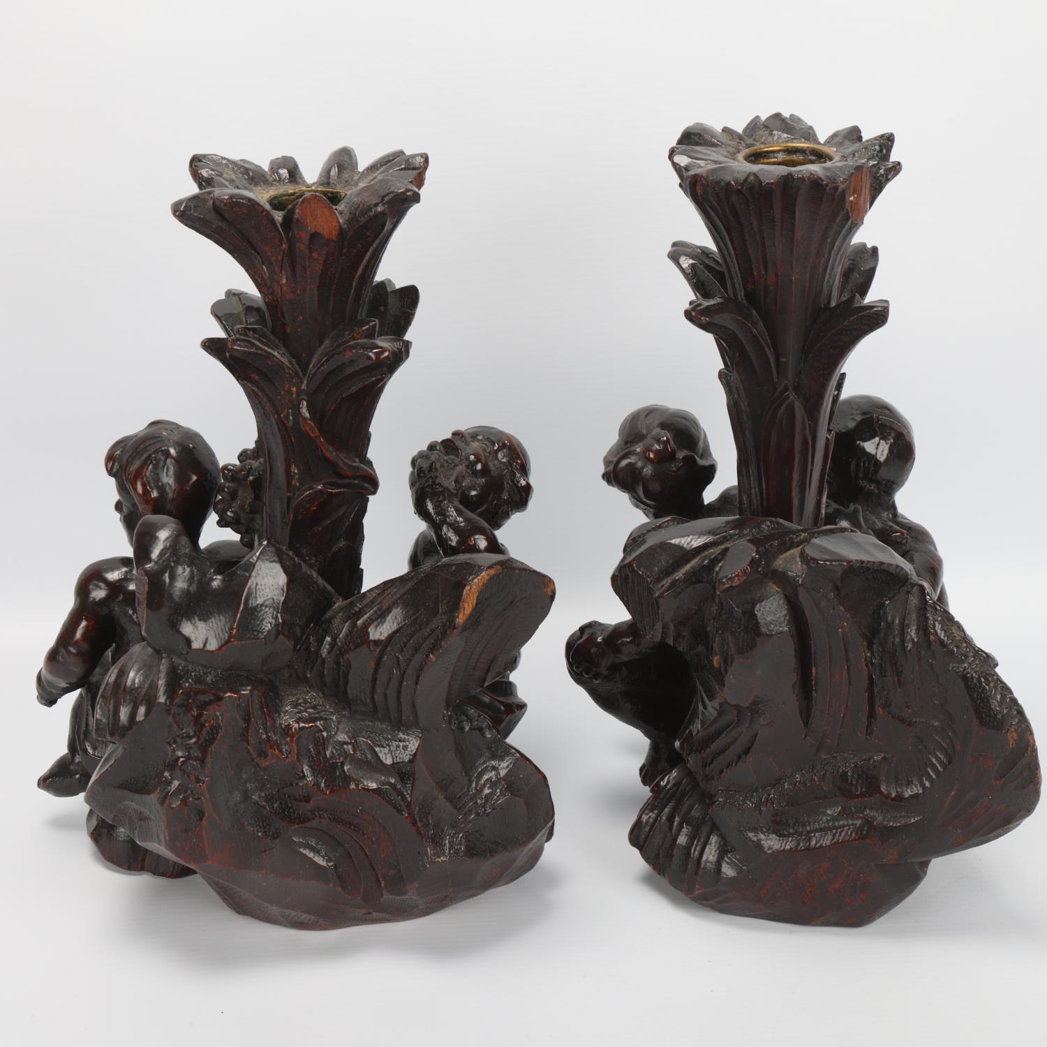 Pair of Antique carved wood newel posts converted to candle holders, each decorated with Classical - Image 2 of 3