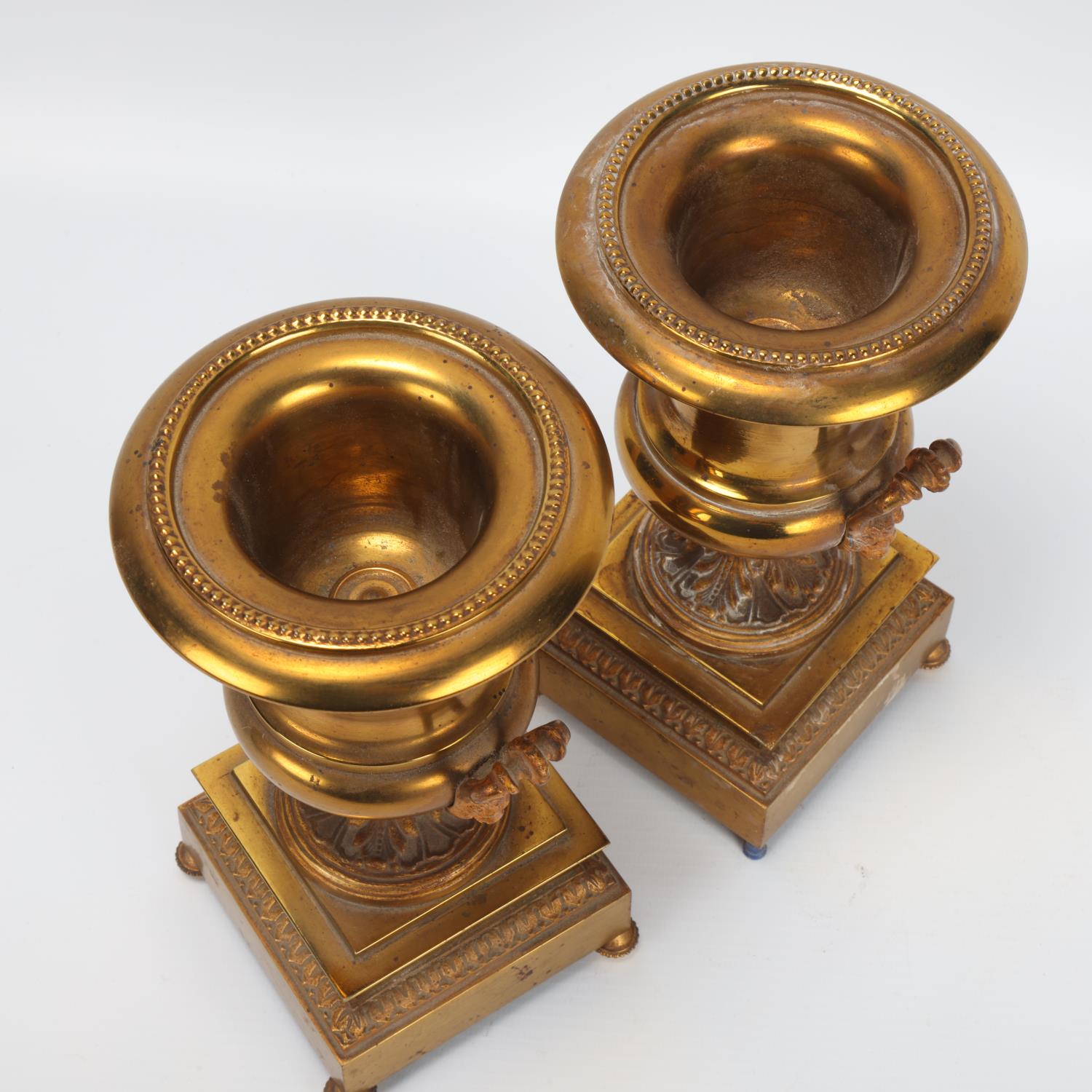 Pair of 19th century gilt-brass campagna form mantel urns on stepped plinths, height 20cm 1 foot - Image 3 of 3