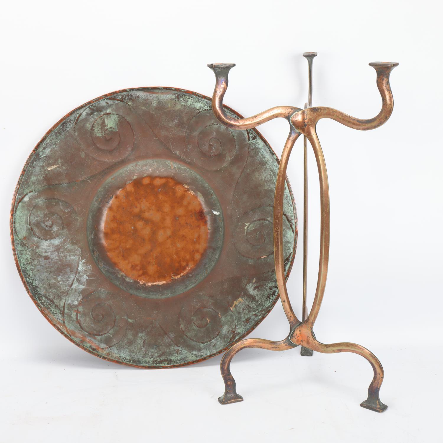 An Arts and Craft embossed copper tray on stylised brass stand, no maker's marks, diameter 42cm No - Image 3 of 3