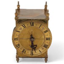 A brass lantern clock, 8-day chain driven single fusee movement, height 21cm, with pendulum