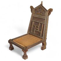Indian carved wood brass and iron-mounted wedding chair, height 92cm