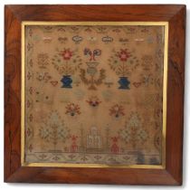 A 19th century needlework sampler, rosewood frame, overall 61cm x 61cm No damage or repairs,