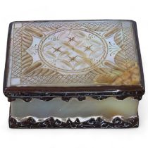 19th century mother-of-pearl and brass-mounted box, with carved lid, length 7.5cm Lid has an area of