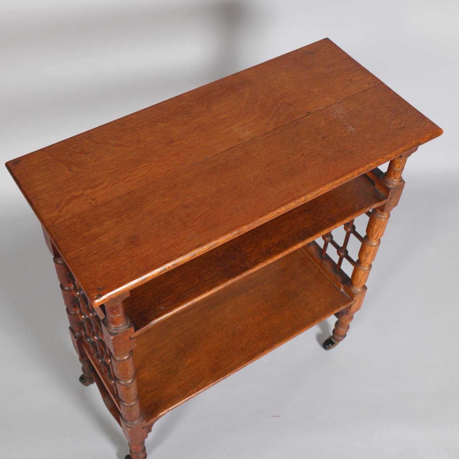 Leonard Wyburd for Liberty & Co, oak 3-tier library table, with bobbin spindle side panels, and - Image 3 of 3