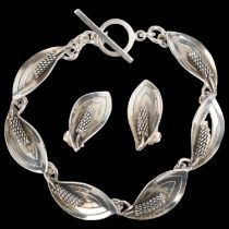 AARRE & KROGH - a a Danish modernist sterling silver floral panel bracelet and pair of clip-on