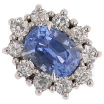 A Sri Lankan 'No Heat' sapphire and diamond oval cluster ring, centrally claw set with 2.44ct oval