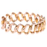 A Victorian 9ct gold expanding bracelet, band width 17.5mm, internal circumference 10 - 25cm, 11g