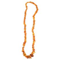 A single-strand Russian rough amber bead necklace, 66cm, 37.2g General wear to high points and a few