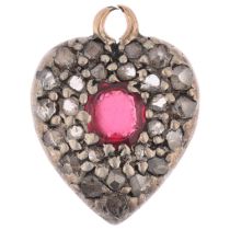 An Antique ruby and diamond heart pendant, pave set with oval mixed-cut ruby and rose-cut