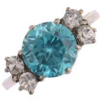 A Vintage blue zircon and white sapphire dress ring, set with 8mm zircon, apparently unmarked,