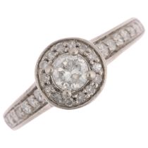 A platinum diamond halo cluster ring, set with modern round brilliant and single-cut diamonds, total