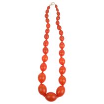 A single-strand graduated amber? bead necklace, beads measure: 24-8.6mm, 42cm, 47.5g All beads