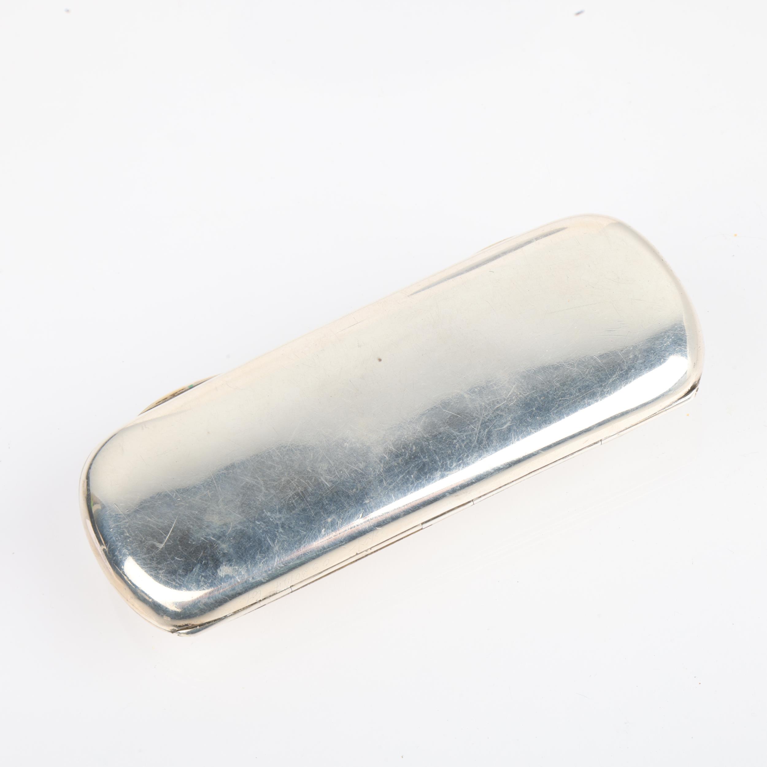 A George V silver spectacles case, Mappin & Webb, Birmingham 1919, oval form with gilt interior, - Image 3 of 3