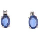 A pair of 9ct white gold sapphire and diamond earrings, set with oval mixed-cut sapphires, rose-
