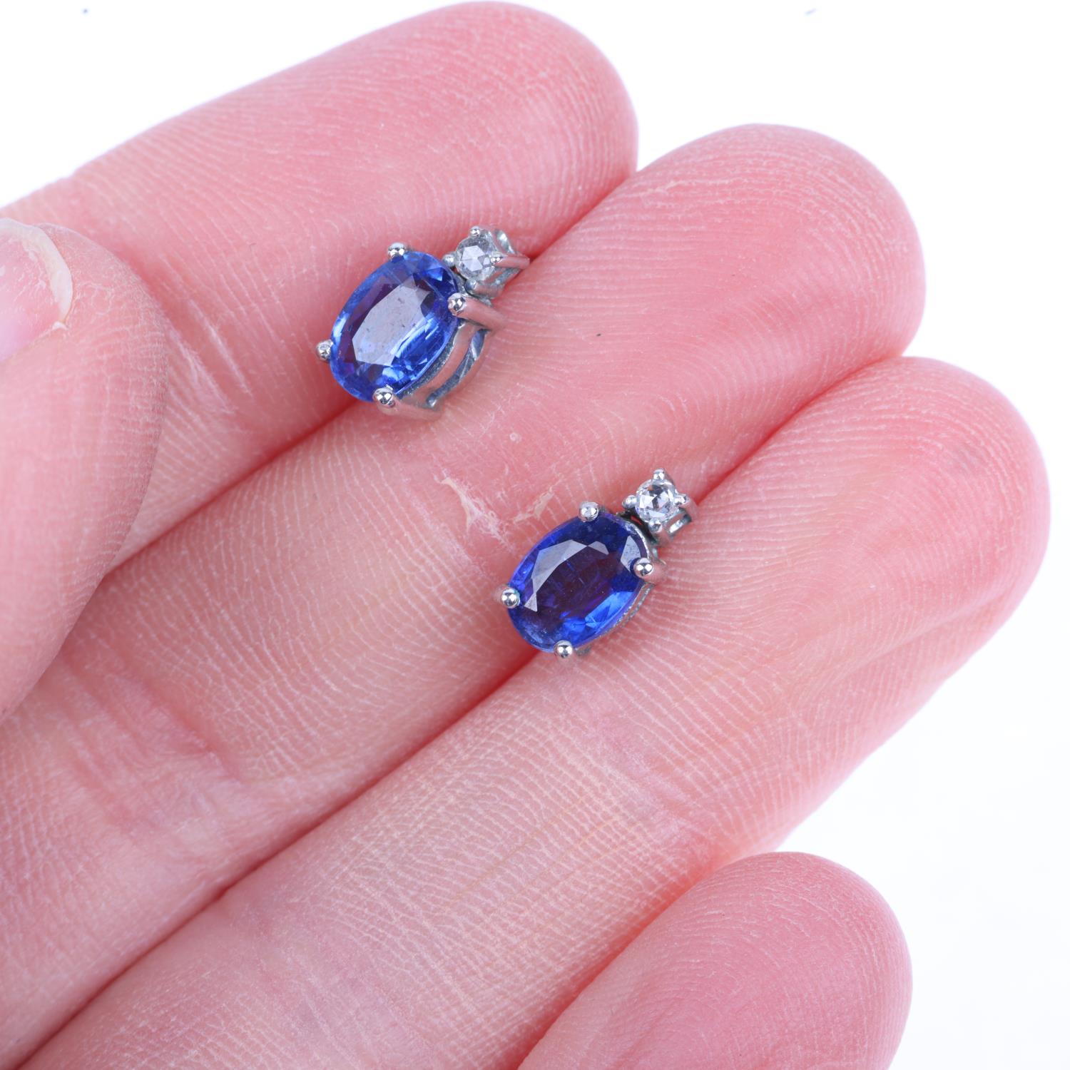 A pair of 9ct white gold sapphire and diamond earrings, set with oval mixed-cut sapphires, rose- - Image 4 of 4