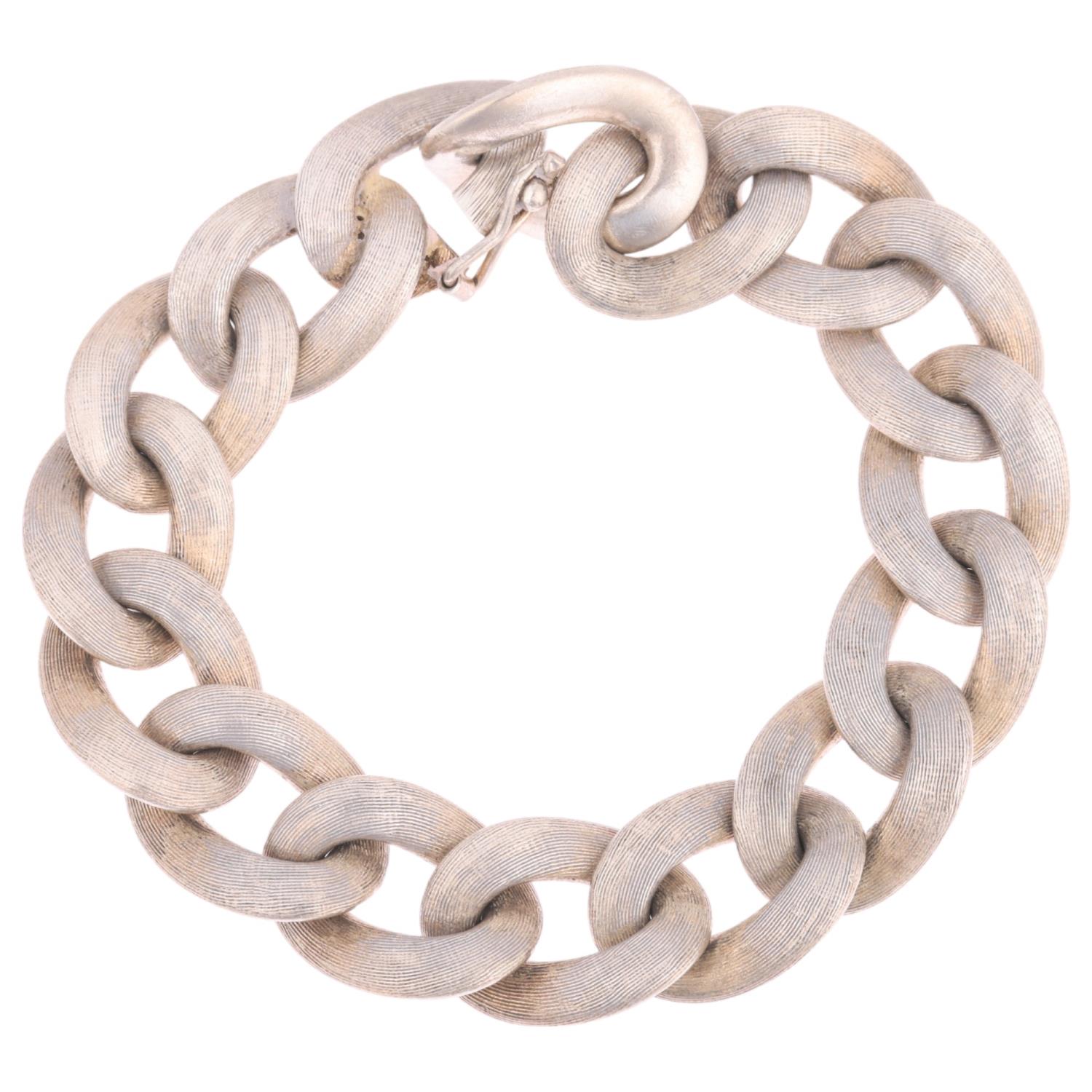 A heavy sterling silver cable link chain bracelet, textured and polished decoration, 19cm, 71.3g