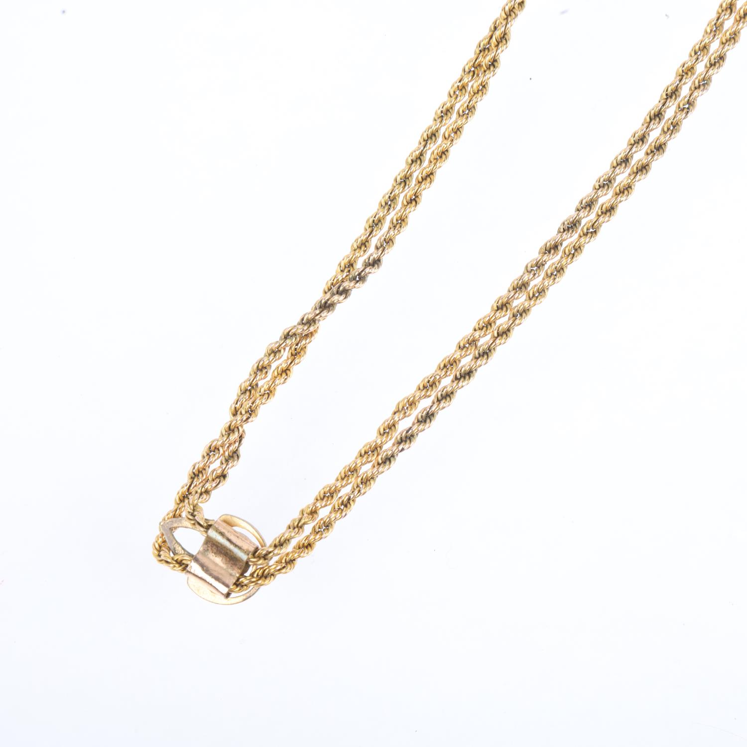 An Antique 15ct gold rope twist long guard chain necklace, with gilt-metal slider fob, 140cm, 21. - Image 3 of 4