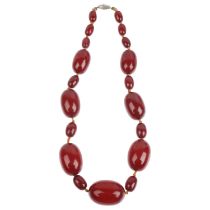 A single-strand cherry amber bead necklace, beads measure: 29.7-11.3mm, 40cm, 48.7g General wear