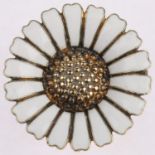 BERNHARD HERTZ - a a Danish modernist sterling silver-gilt white enamel daisy pattern brooch, 29.
