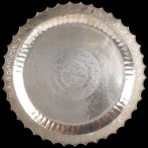 A large Malay silver platter tray, Malay Peninsular or Riau, 19th-early 20th century, with relief