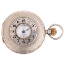 An early 20th century silver half hunter keyless side-wind pocket watch, by Thomas Russell & Son,