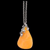 A large Art Nouveau style Danish sterling silver and butterscotch amber floral pendant necklace,