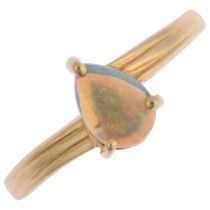 A modern 14ct gold solitaire opal ring, claw set with pear cabochon opal, opal measures approx 6.