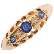 An early 20th century 18ct gold graduated five stone sapphire and diamond half hoop ring, maker CGH,