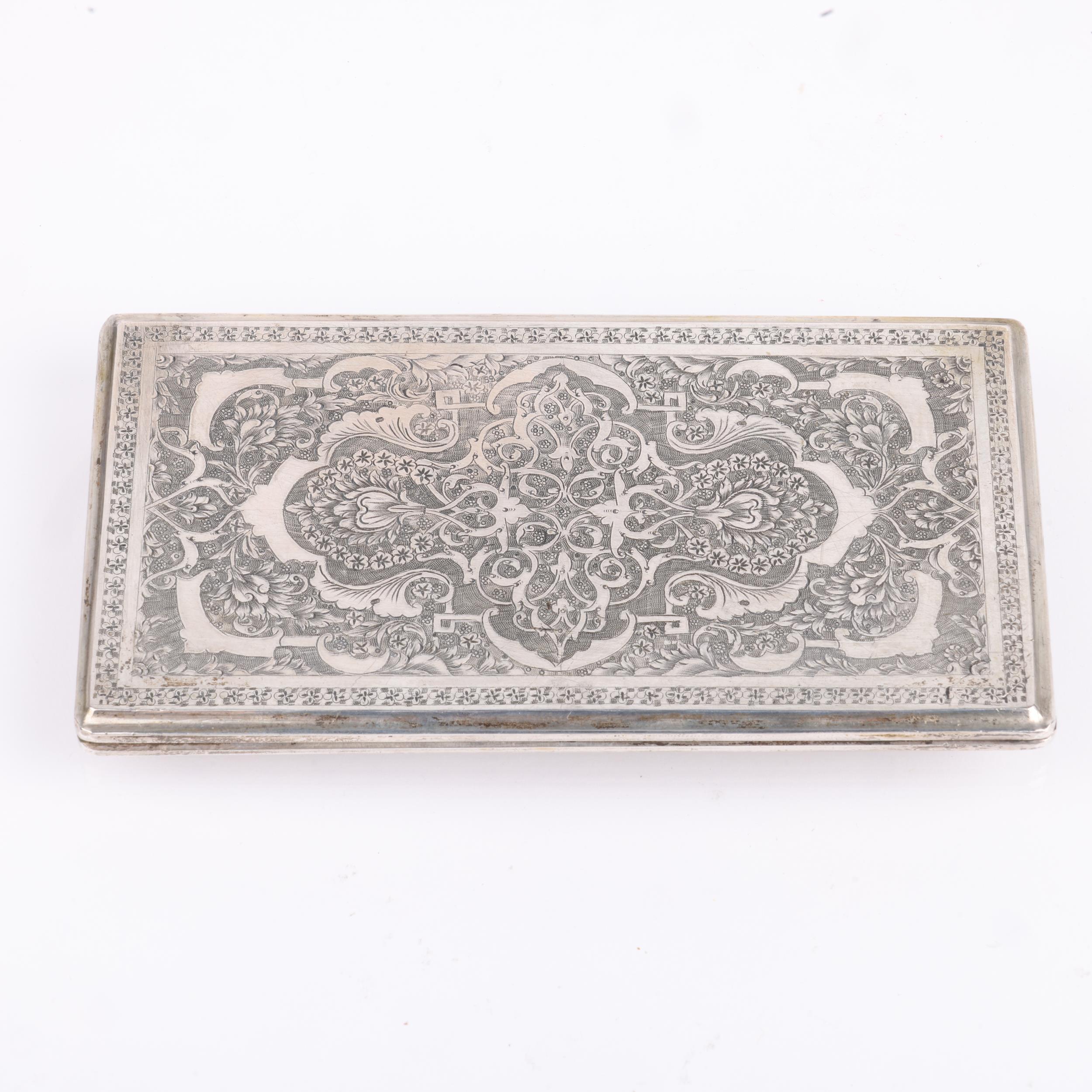 A fine Persian silver floral cigarette case, allover engraved decoration with sprung hinge, marks - Image 2 of 3