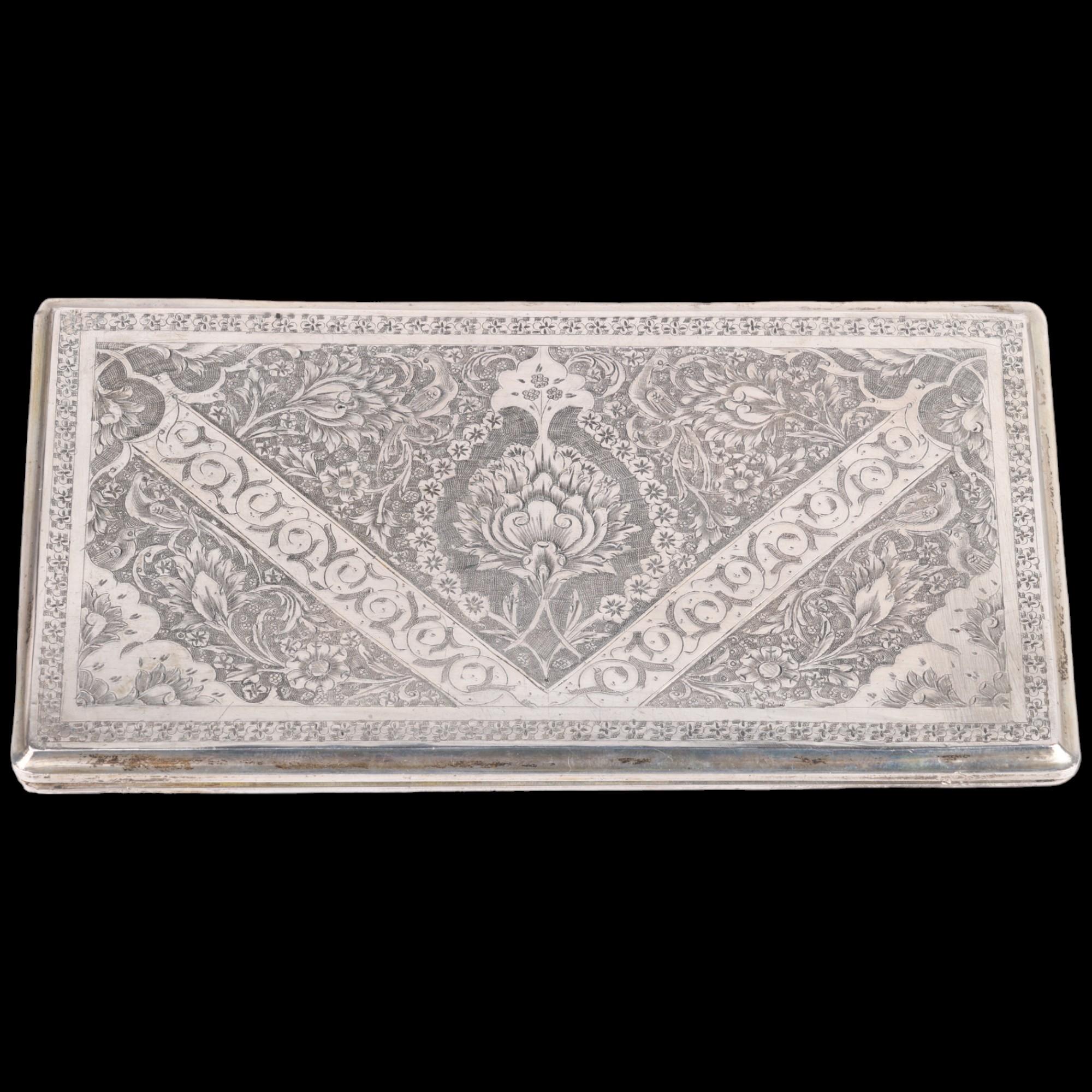 A fine Persian silver floral cigarette case, allover engraved decoration with sprung hinge, marks