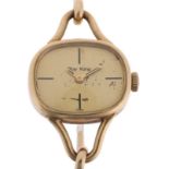 ROY KING - a lady's Vintage 9ct gold mechanical bangle watch, circa 1970s, champagne dial with