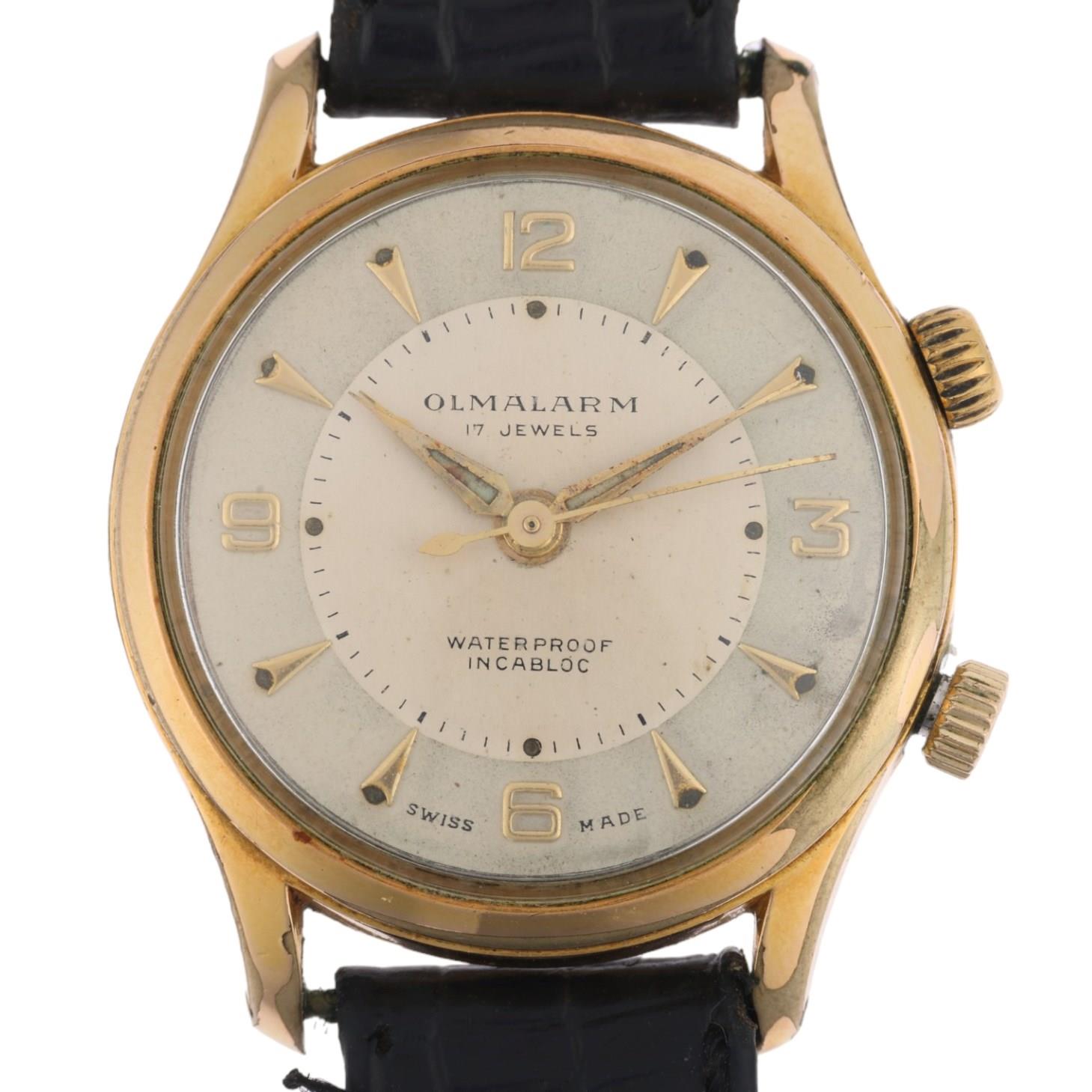 OLMA - a Vintage gold plated stainless steel Olmalarm mechanical wristwatch, silvered dial with gilt