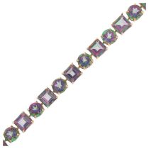 A modern 9ct gold mystic topaz tennis line bracelet, 20cm, 12g No damage or repair, clasp working