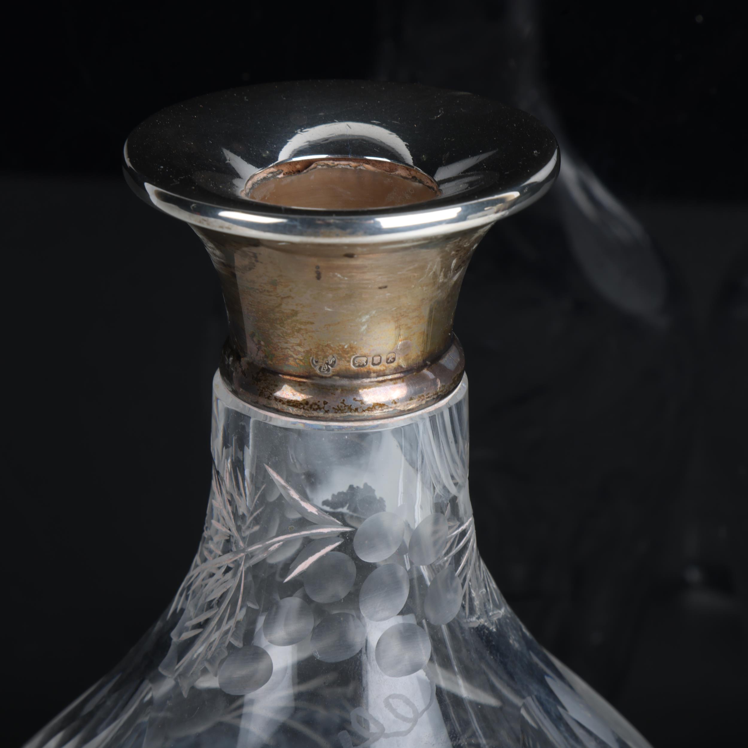 A pair of Elizabeth II silver-mounted glass wine decanters and stoppers, CJ Vander Ltd, London 1965, - Image 3 of 3