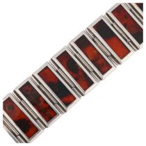 A late 20th century Polish sterling silver and Baltic amber panel bracelet, maker JZ, Gdansk,