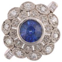 A platinum sapphire and diamond flowerhead cluster ring, maker JC, set with 1ct round-cut sapphire