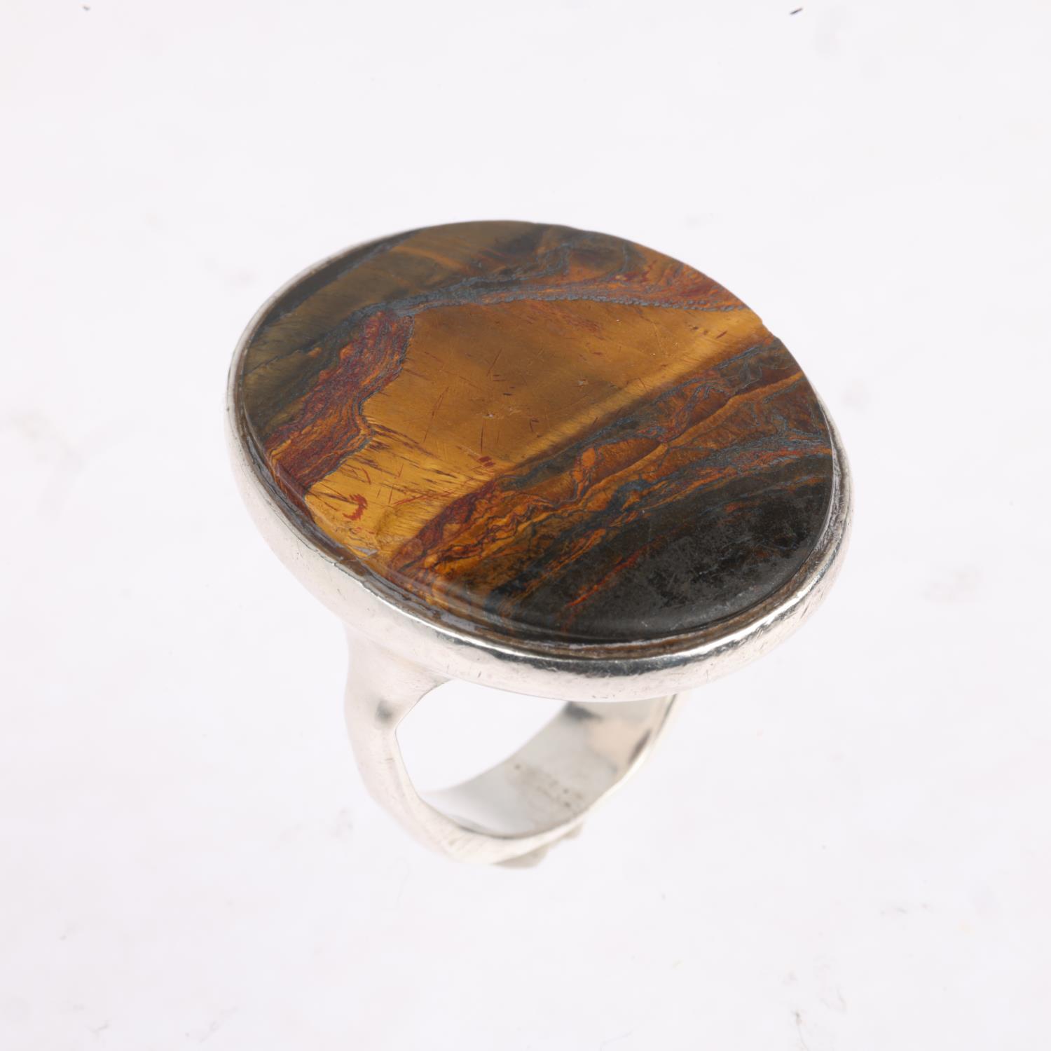 A large German sterling silver tigers eye dress ring, maker KH, setting height 30.5mm, size P, 18g - Image 2 of 3