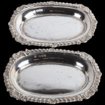 A pair of Edwardian silver pin dishes, George Nathan & Ridley Hayes, Chester 1902 and 1904, 11cm x