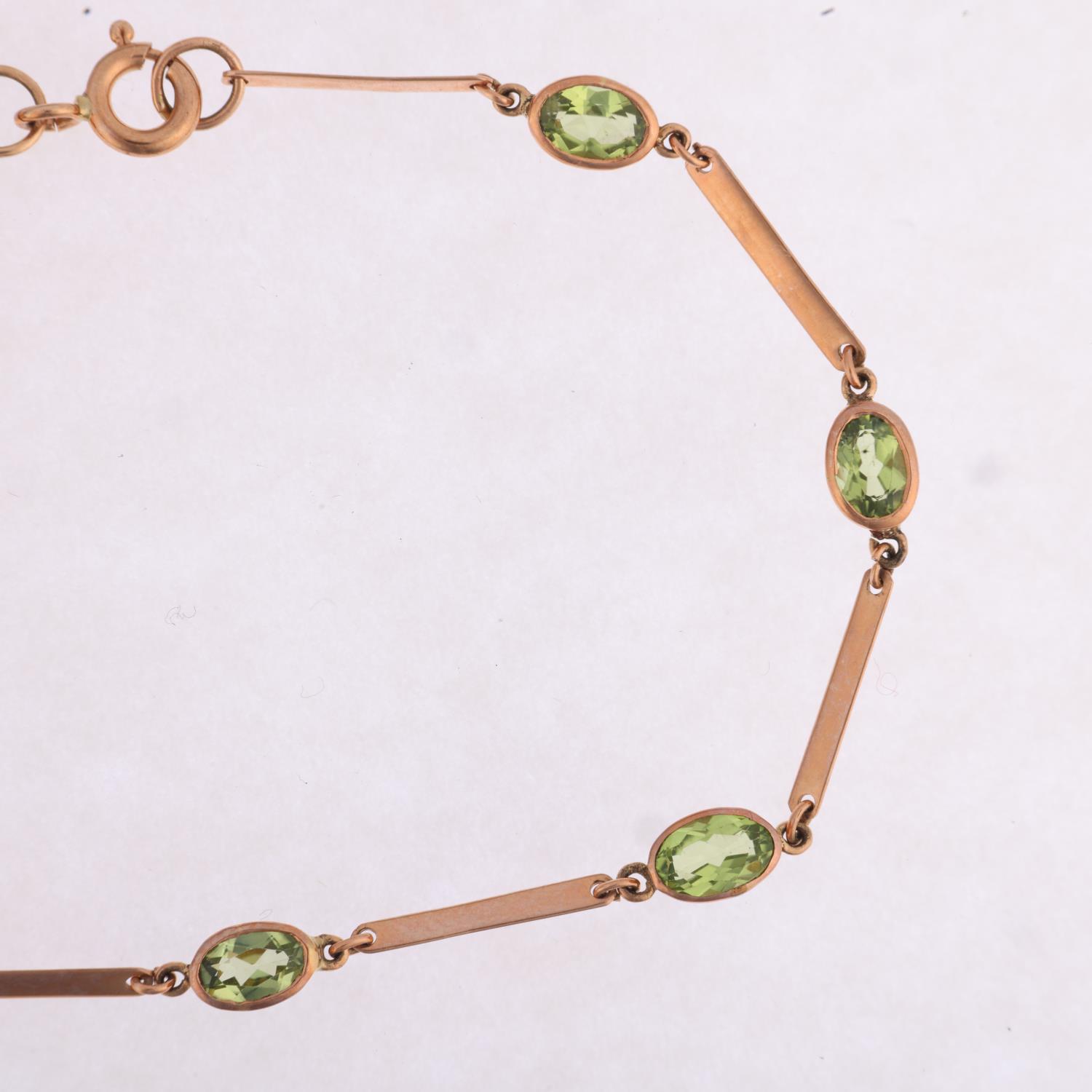 A 9ct rose gold peridot tennis line bracelet, maker SA, London 2011, rub-over set with oval mixed- - Image 2 of 4