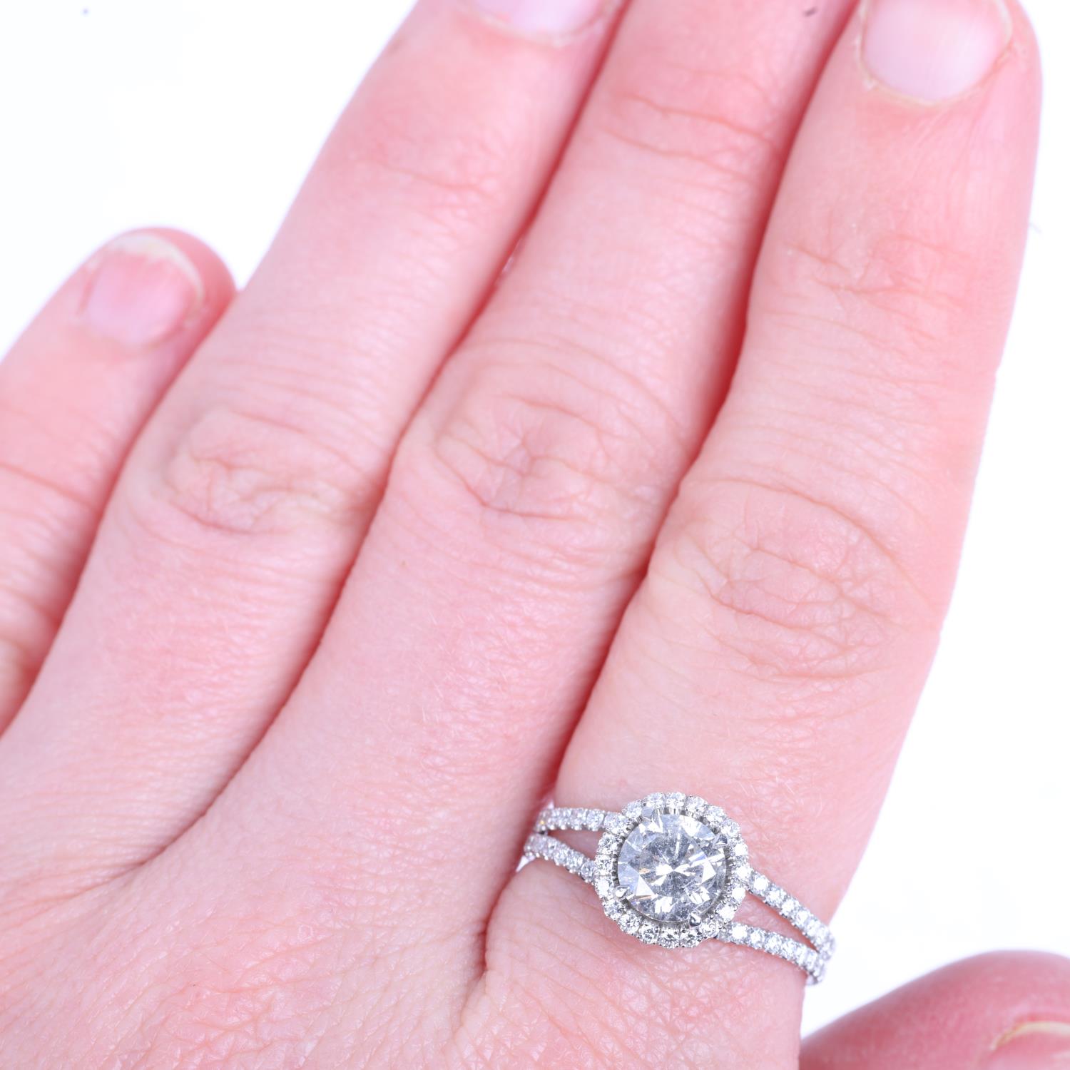 A modern diamond halo cluster ring, centrally set with 1ct modern round brilliant-cut diamond - Image 4 of 4