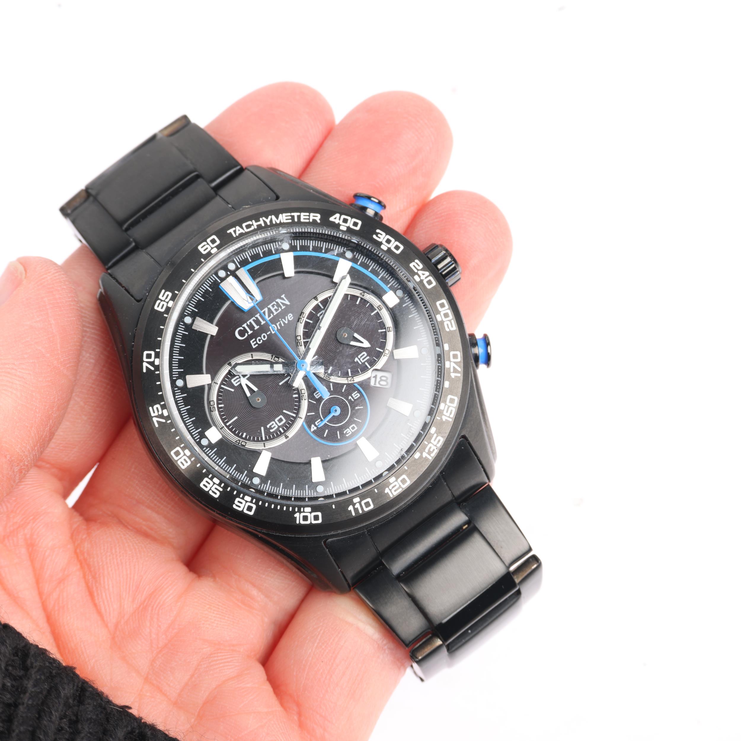 CITIZEN - a black coated stainless steel Eco-Drive quartz chronograph calendar bracelet watch, - Bild 5 aus 5