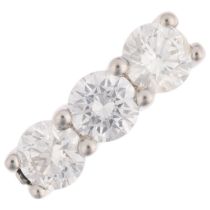 A platinum three stone diamond ring, claw set with modern round brilliant-cut diamonds, total