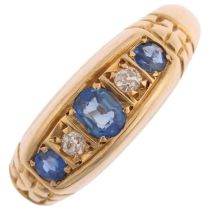 An early 20th century 18ct gold graduated five stone sapphire and diamond half hoop ring, indistinct