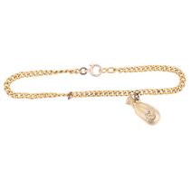 An 18ct gold hollow curb link chain bracelet with 9ct moneybag charm, 16cm, 2.1g No broken links,