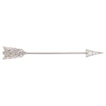 An Art Deco diamond 'Arrow' jabot pin, circa 1920, set with round and old-cut diamonds, unsigned and