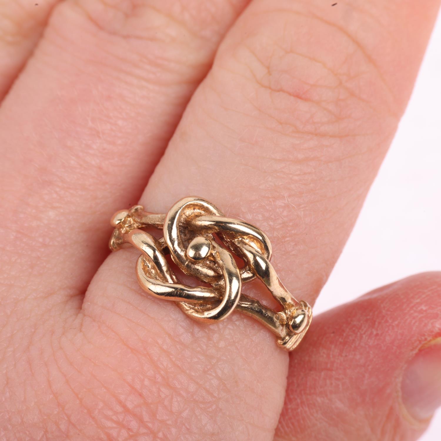 A late 20th century 9ct gold knot ring, maker A&AJ, London 1979, setting height 9.9mm, size Q, 3. - Image 4 of 4